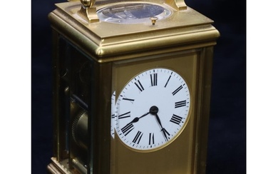 A brass half-striking repeat carriage clock, stamped G & B t...