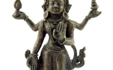 A cast bronze figure of Vishnu, modelled