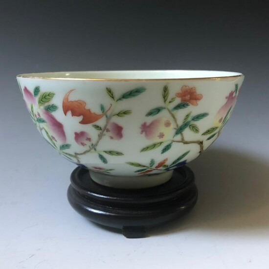A chinese famille rose flower bowl guanxiu mark