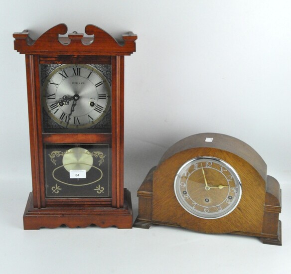 A contemporary C. Wood & Son wall clock together with a wooden cased mantel clock