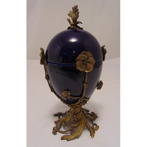 A continental egg shaped ceramic vase and cover with ormolu ...