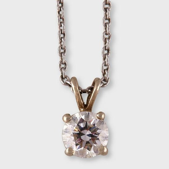 A diamond and platinum solitaire pendant