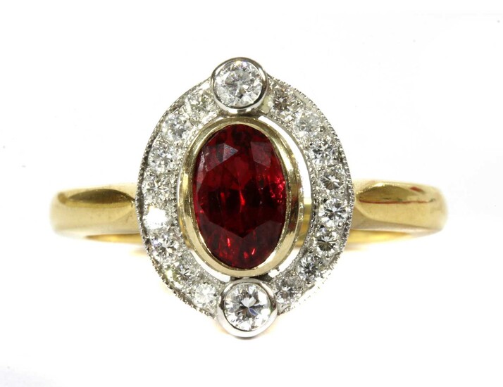 A gold red spinel and diamond cluster ring