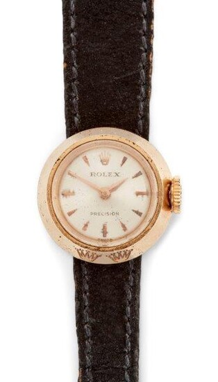 A lady's wristwatch, by Rolex, the circular dial with applied arrow head markers, and crown logo at 12 o'clock and gilt hands signed Rolex, precision, jewelled lever movement in beveled circular case, numbered 737449, c.1960, case width 17mm