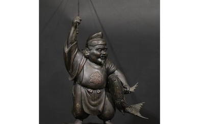 A large Japanese bronze figure, Ebisu, the Japanese god of f...