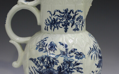 A large Worcester blue painted jug, circa 1770-85, decorated with the Pine Cone Group pattern over a