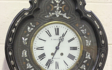 A late 19th century French ebonized and inlaid tableau comtoise wall clock with eight day movement s