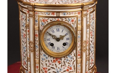 A late 19th century Wedgwood mantel clock, demi-lune porcela...