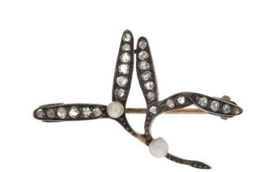 A mid Victorian gold and silver, diamond and pearl brooch