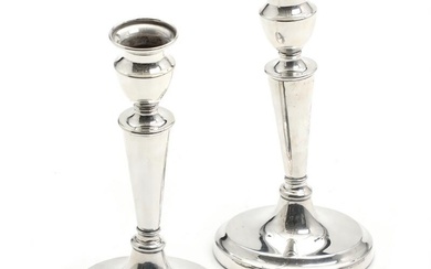A pair of Danish candlesticks of sterling silver. Stamped E.T.J Sterling Denmark....
