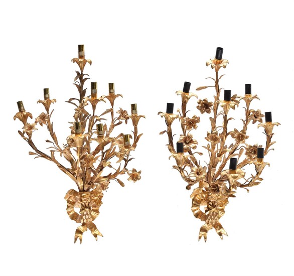 A pair of French gilt metal nine light wall appliques in Louis XV style