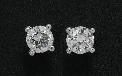 NOT SOLD. A pair of diamond solitaire ear studs each set with a brilliant-cut diamond weighing a total of app. 0.77 ct., mounted in 18k rhodium plated gold. Top Cape/VS. – Bruun Rasmussen Auctioneers of Fine Art