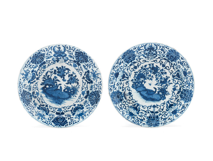 A pair of large blue and white Dutch-Market armorial dishes