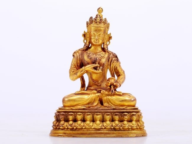 A sacred gilt bronze Vajrasattva statue