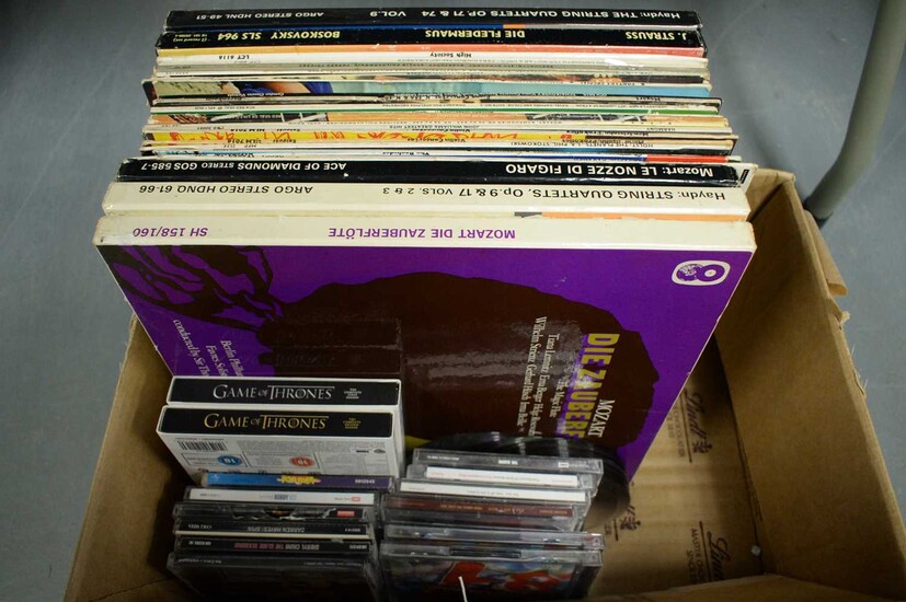 A selection of classical vinyl records, together with CDs and DVDs