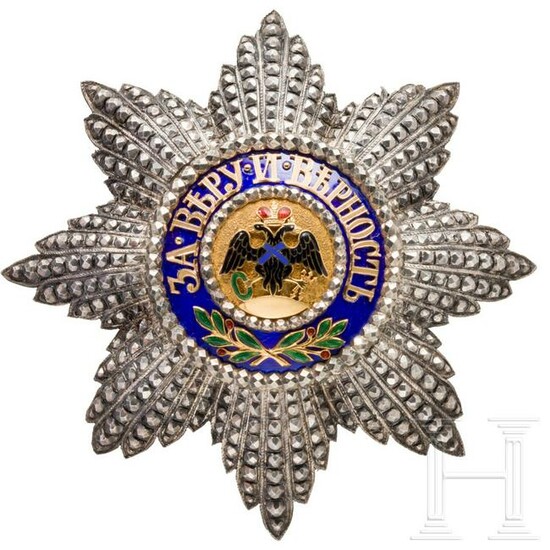A silver, partially enamelled breast star of the Order