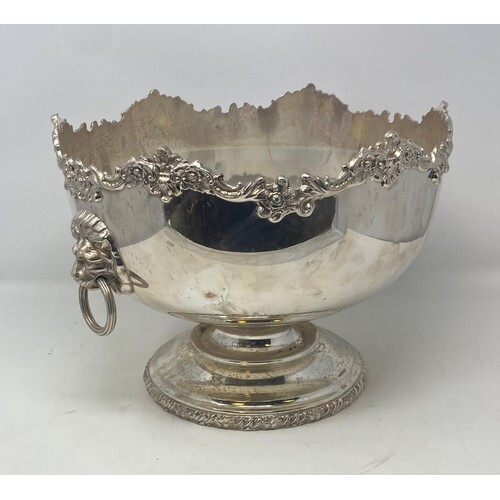 A silver plated punch bowl, with lions head ring handles, 32...