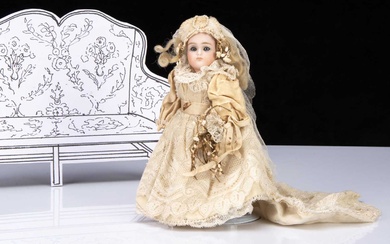 A small German bisque headed bride doll