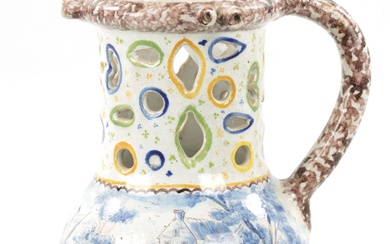 AN 18TH CENTURY DUTCH DELFTWARE PUZZLE JUG with polychrome...