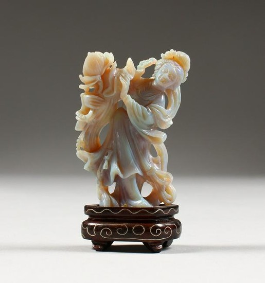 AN UNUSUAL CHINESE CARVED OPAL FIGURE, of a woman