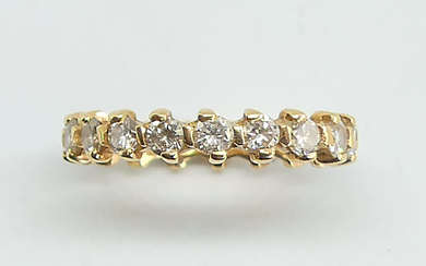 American ALLIANCE in yellow gold set with 19 diamonds. Gross weight 2.53 g. Diamond weight 1.52 ct. TTD 52