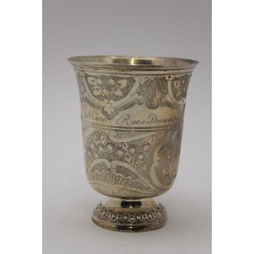 An 18th century French silver beaker, flared rim, the body c...