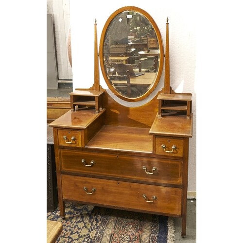 An Edwardian mahogany and line inlaid dressing table, with o...