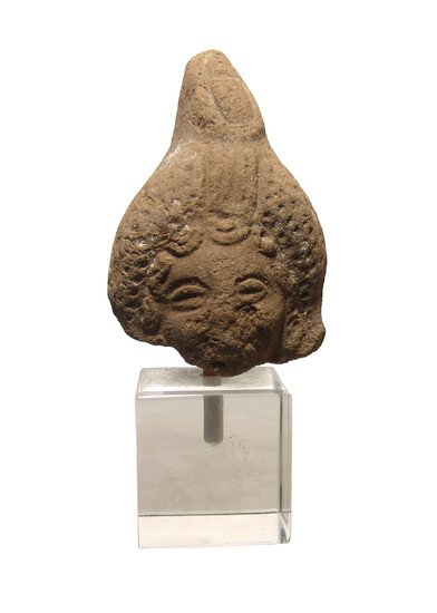An Egyptian terracotta head of Harpokrates