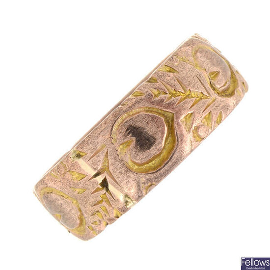 An early 20th century 9ct gold textured band ring.