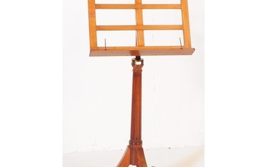 An early 20th century mahogany music stand. The stand suppor...