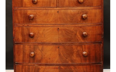 An early Victorian mahogany bowfront split chest, slightly o...