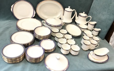 An extensive Paragon porcelain dinner/tea service with blue and gilt...