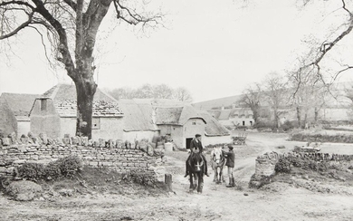 British School, early-mid 20th century- Farm labourers with a horse and a pony by a gate with thatched barns; gelatin silver print, 27x38cm Provenance: Property of Future PLC, removed from the offices of Country Life magazine.