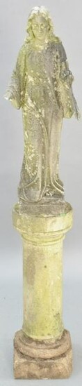 Carved marble garden figure of a woman holding a