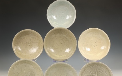 China, collection of fourteen celadon-glazed shallow bowls, Northern Song dynasty, 10th-12th century