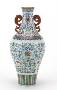 Chinese porcelain doucai vase with iron red handles, finely ...