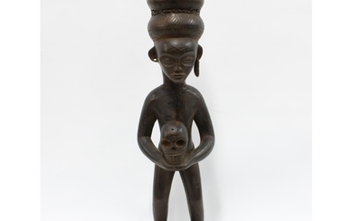 Congo, carved wooden African figure, modelled standing and h...