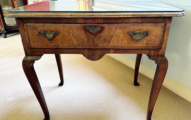 Early 18th century walnut and feather banded lowboy