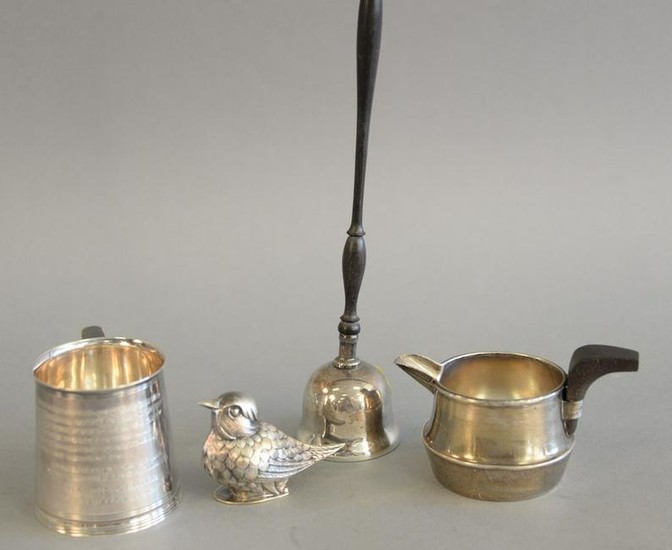 Four piece silver lot bell, small mug, bird and small