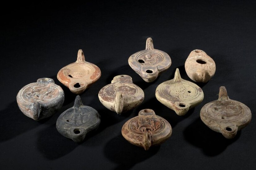 Lot consisting of nine oil lamps Roman and Islamic