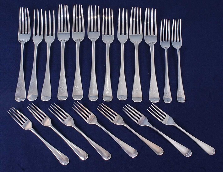 A large selection of George III and later table and dessert forks