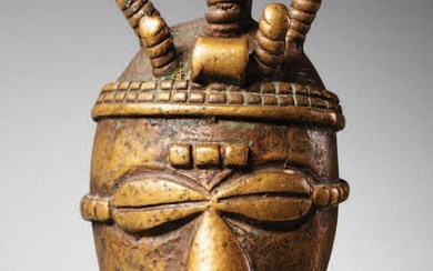 Masquette Côte d'Ivoire/Ghana Bronze H. 5,9 cm Masquette en bronze figurant un visage humain de...