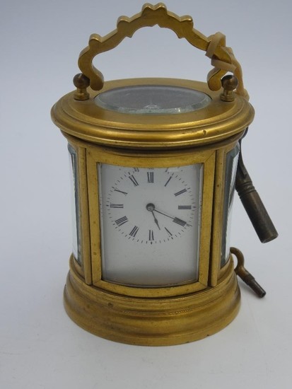 Miniature French C19th oval carriage timepiece, the lever mo...