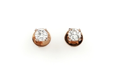 Pair of 14 kt gold earrings with brilliants...