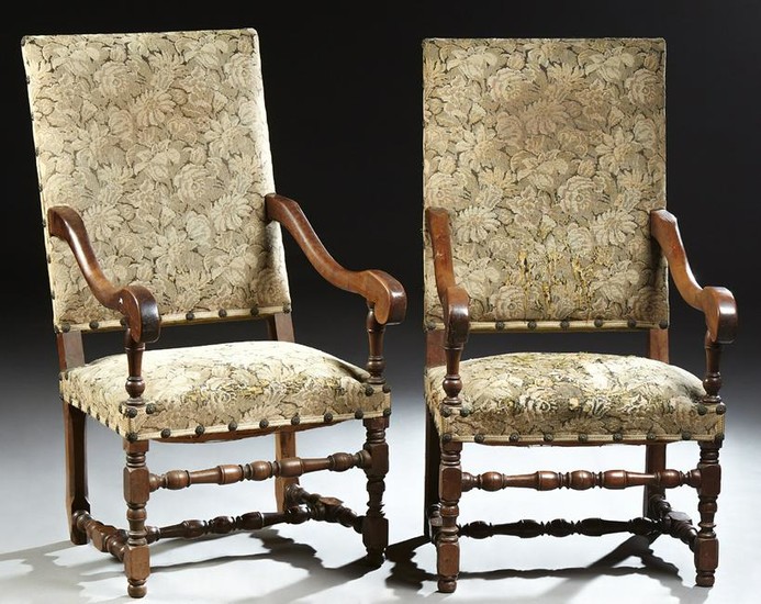 Pair of French Louis XIII Style Carved Walnut Fauteuils