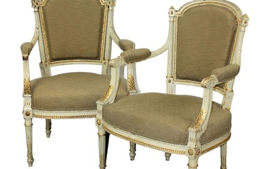 Pair of French Louis XVI style painted armchairs with gilt detail