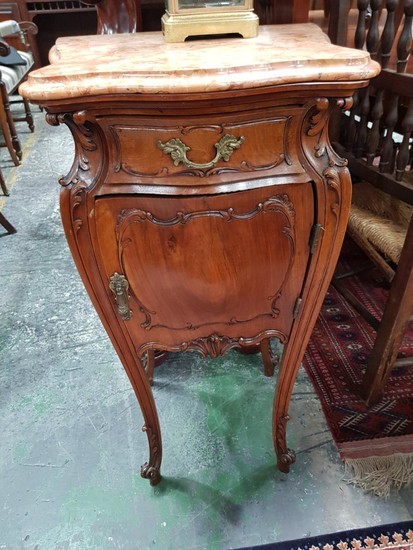 Pair of Louis XV Style Carved Walnut Bedside Cabinets, with marble tops, fitted with a drawer and panel door, on cabriole legs