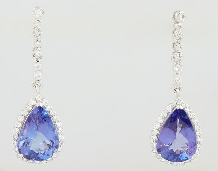 Pair of Platinum Pendant Earrings, with a diamond