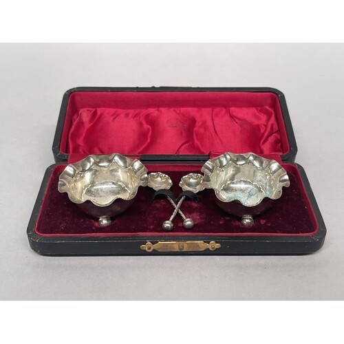 Pair of antique sterling silver salts and spoons (original c...