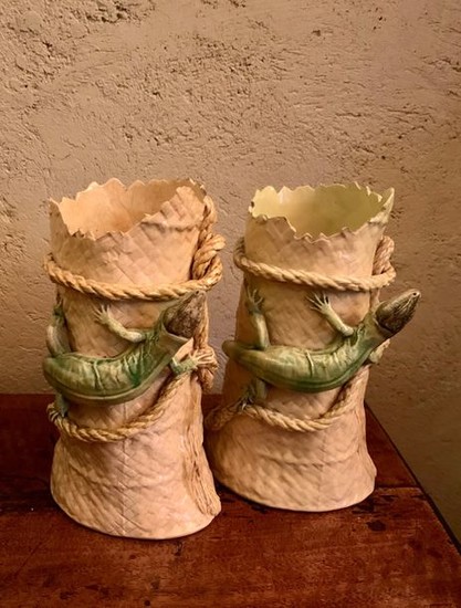 Pair of cream and green glazed earthenware vases,...